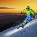 Mathis from Mt Buller Chalet Buller Sports enjoying a sunset ski on summit