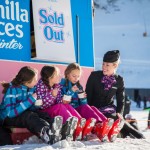 Kate Dunbar with girls on Snow Cat