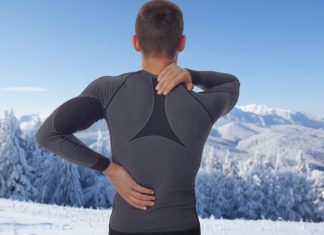 How to prevent back pain and injury when skiing or snowboarding
