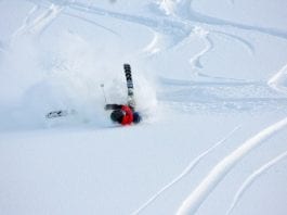 woman crashing ski