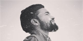 Eight easy ways to save your skin on the ski slopes canva grayscale photo of man in zip up jacket
