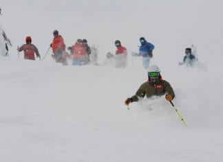 The best ski/board improvement camp that includes heli and cat! chicks