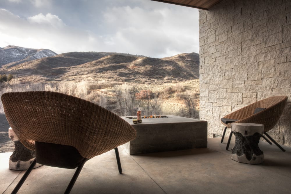 mountain and valley view from the patio of a suite in earth house