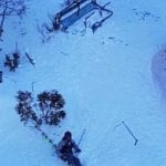 skier with broken chair