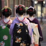 Back,View,Of,Three,Geisha,Going,For,Their,Appointment,At