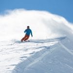 Skier with snow spray