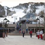 Skiers in East Dean Court at the foot of Aspen Mountain.